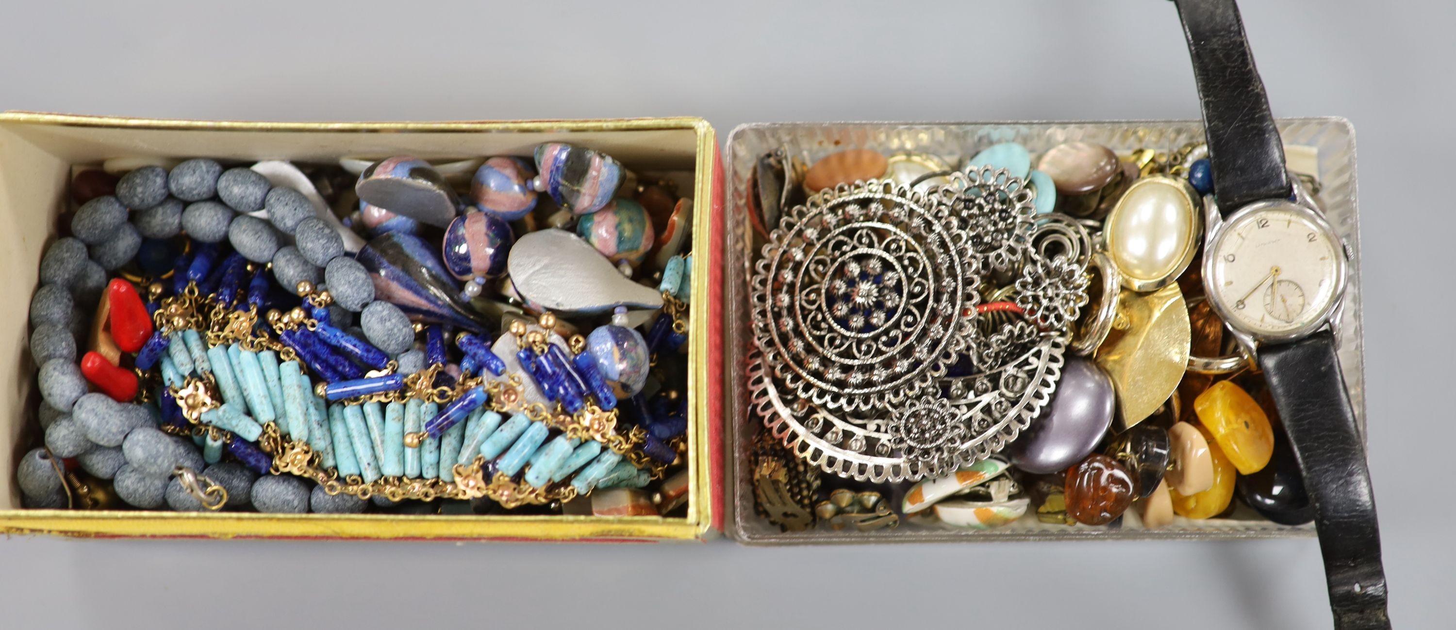 A large quantity of assorted mainly costume jewellery and a gentleman's steel Longines manual wind wrist watch.
